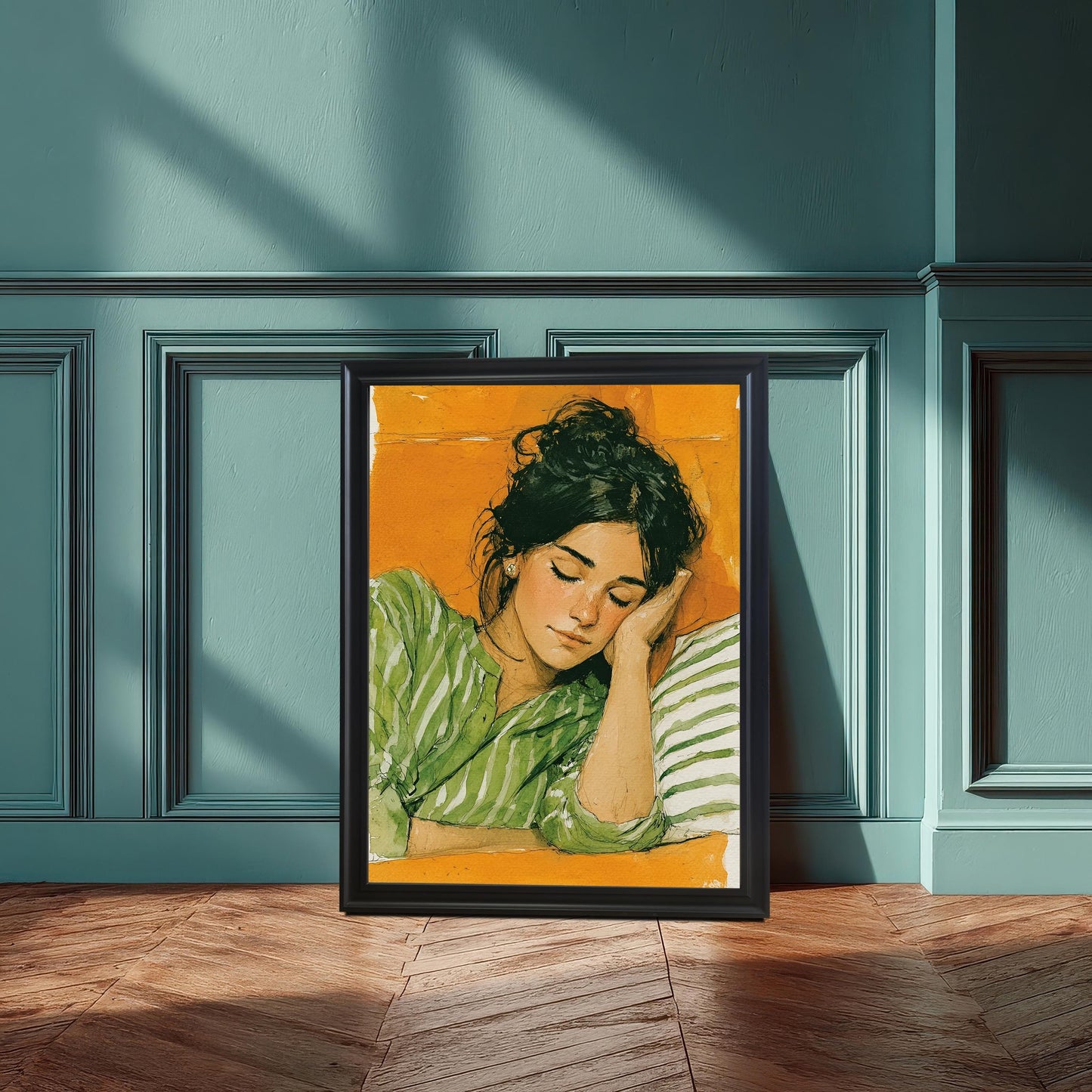 A painting of a sleeping woman in a green striped shirt, leaning against a striped pillow. The black-framed artwork rests on a wooden floor against a teal paneled wall.