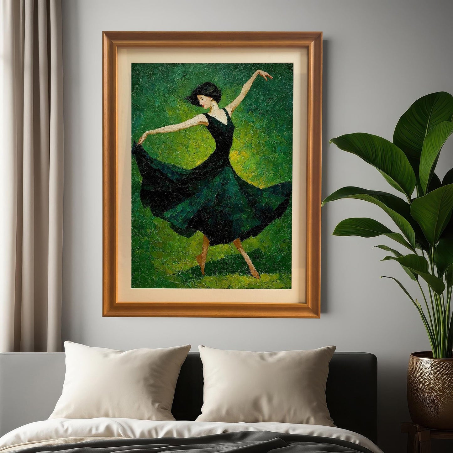 A framed painting of a dancer in a dark green dress hanging on a gray wall above a bed. The frame is a light brown wood with a gold inner trim.