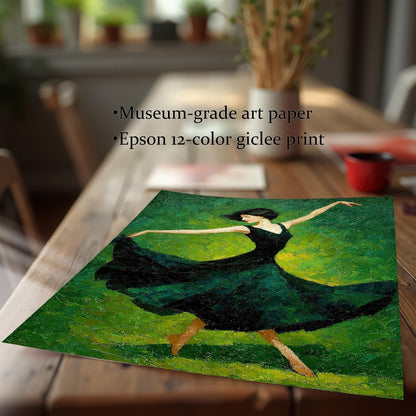 A close-up view of the painting, featuring a female dancer in a dark green dress. The unframed print is lying on a wooden table with some blurred plants and a red mug in the background.
