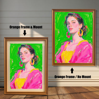 Two framed art pieces are shown side by side against a paneled wall. One is an "Orange Frame & Mount," and the other is an "Orange Frame / No Mount," showing the effect of a mat.