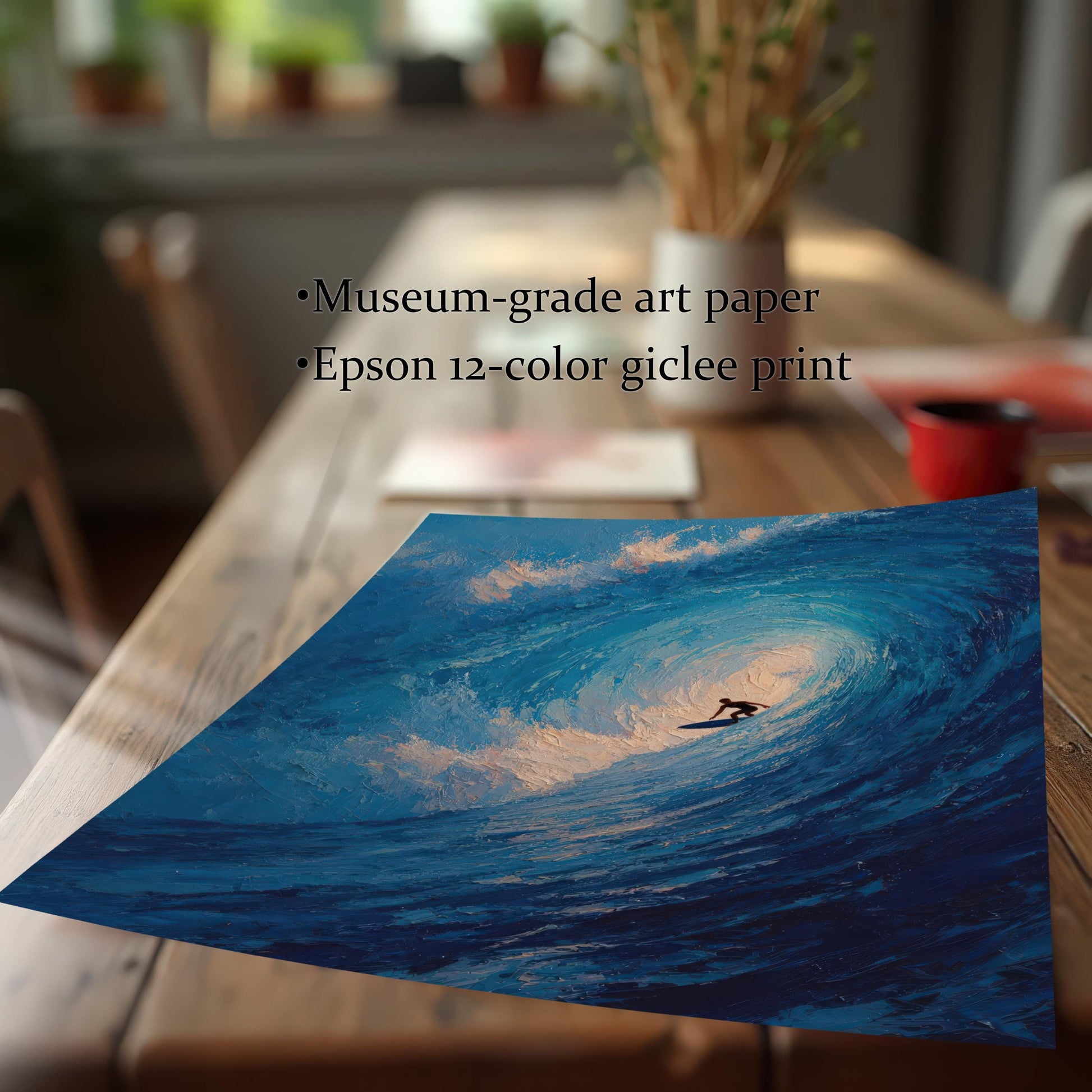 A close-up, angled shot of an unframed print of a surfer on a wave resting on a wooden table. Bullet points list the product features: "Museum-grade art paper" and "Epson 12-color giclee print."