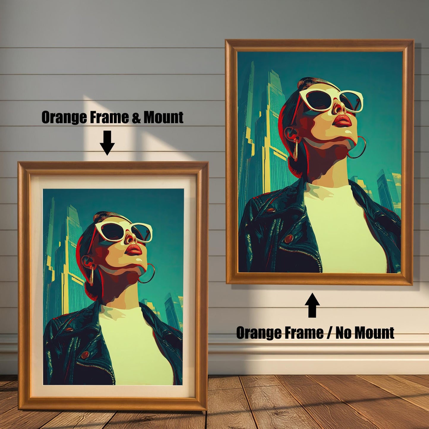 An art print of a woman in a leather jacket and sunglasses is shown in two orange-gold frames against a wood wall. One has a mount, and the other doesn't, illustrating the framing choices.