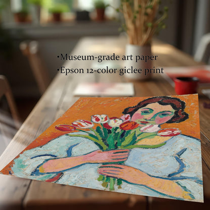 A close-up, angled shot of a print of a woman holding tulips. Text overlays highlight the quality: "Museum-grade art paper" and "Epson 12-color giclee print."