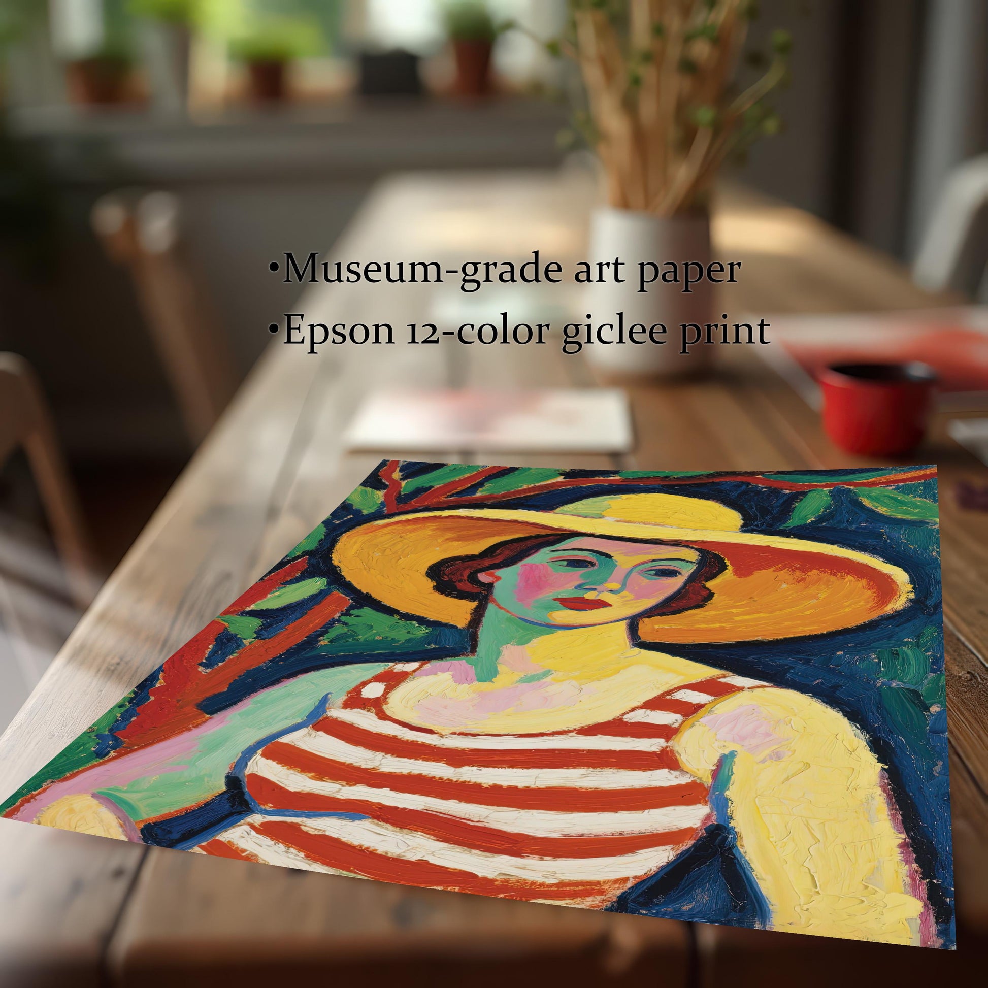 A close-up, angled shot of a print of a woman in a striped top and yellow hat. Text overlays highlight the quality: "Museum-grade art paper" and "Epson 12-color giclee print."