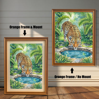 Two framed paintings of a leopard drinking from a pool. The left one has an orange frame with a mount, and the right one has an orange frame with no mount.