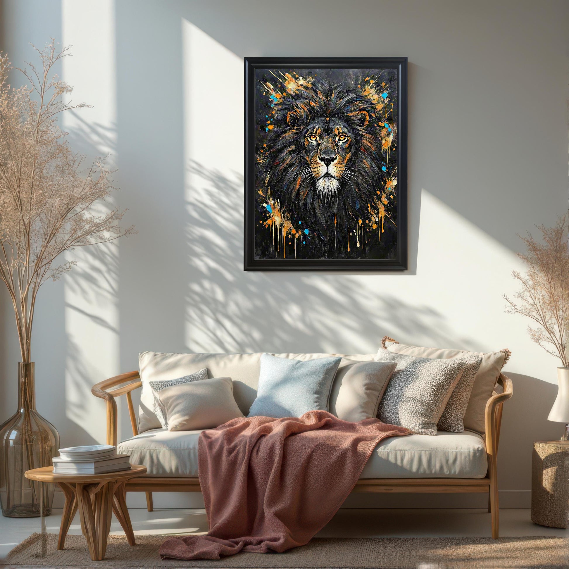 Framed wall art of an abstract lion portrait, hung in a living room above a couch.