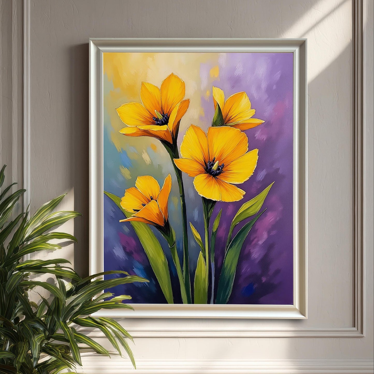 A white-framed print featuring a painting of yellow flowers on a purple and blue background hangs on a beige wall with decorative trim.