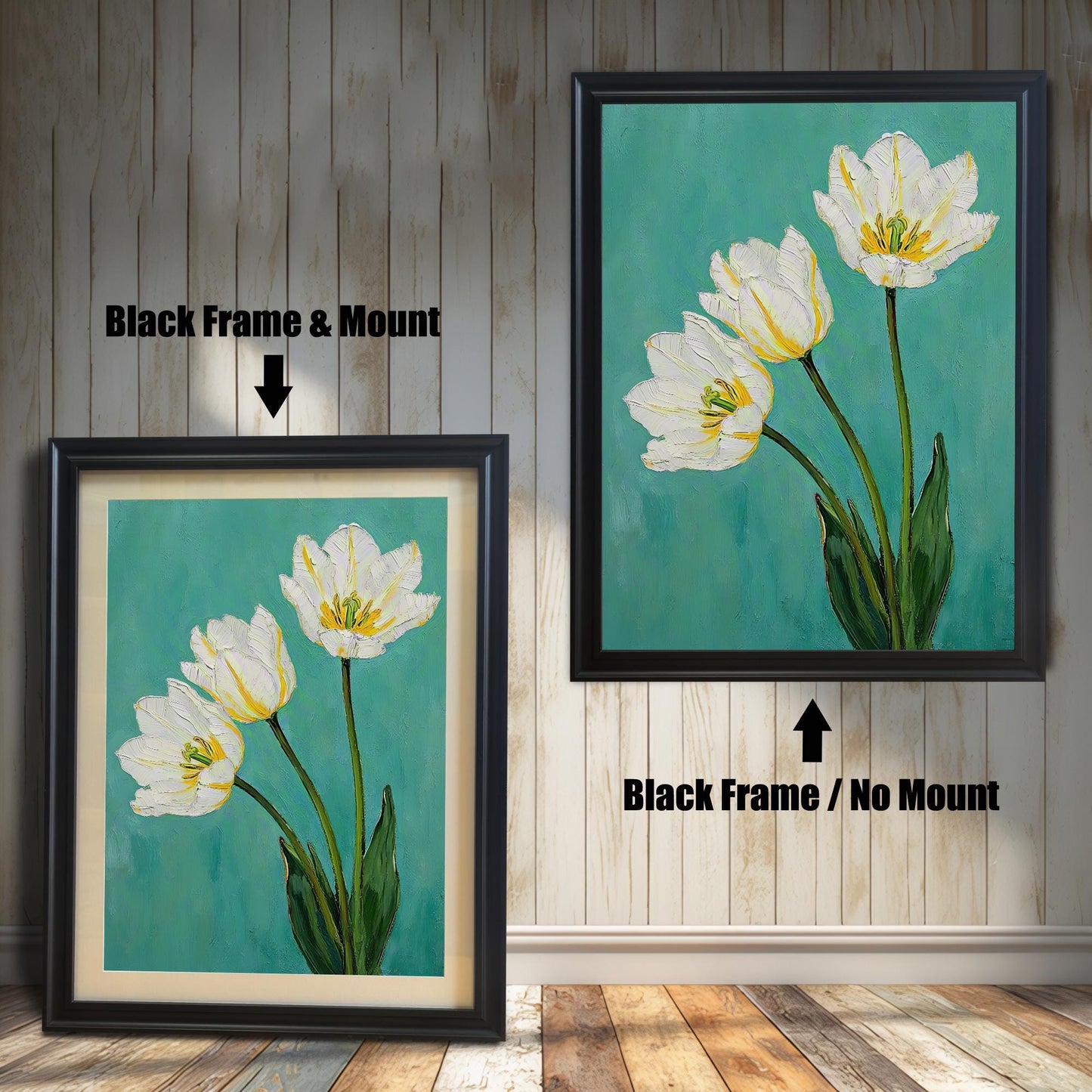 A framed art print of three white tulips, showing two options: one in a black frame with a tan mat and one in a black frame without a mat. The background is a vertical wooden wall.