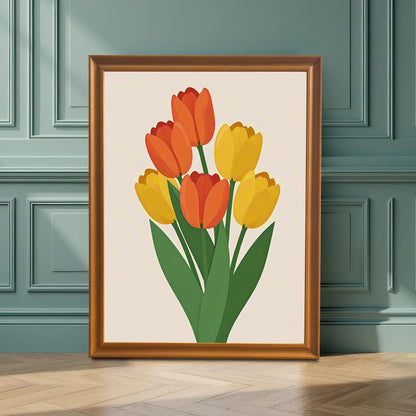 A framed art print of orange and yellow tulips stands on a light wood floor leaning against a teal, paneled wall.