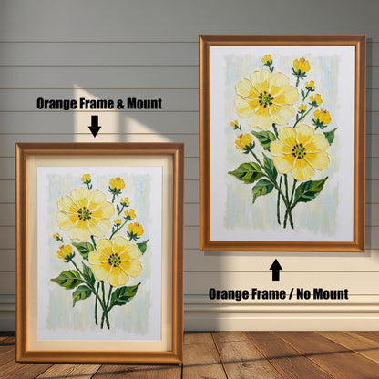 An orange-brown-framed art print of yellow flowers is shown in two versions: one with a mount (mat) on the left and one without a mount on the right.