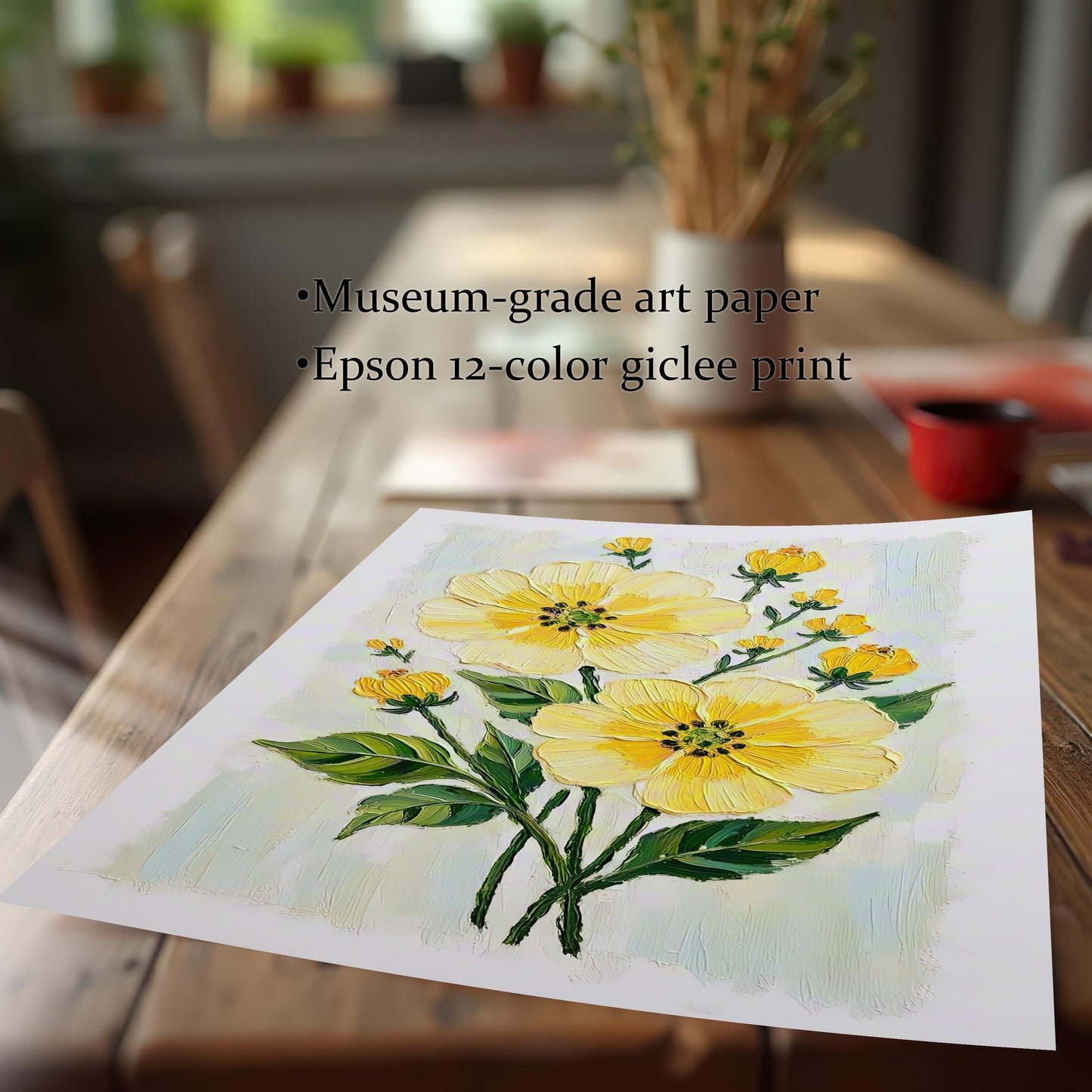 An unframed art print of yellow flowers is on a light wood table next to a red cup. Text notes it is a "museum-grade" giclée print.