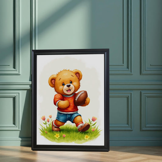 A black wood framed art print of a happy teddy bear holding a football, leaning on a wood floor against a stylish teal paneled wall.