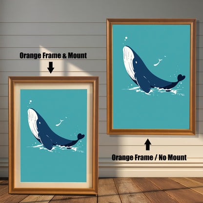 Two framed whale prints. The one on the left has an orange frame with a white mount, and the one on the right has an orange frame without a mount.