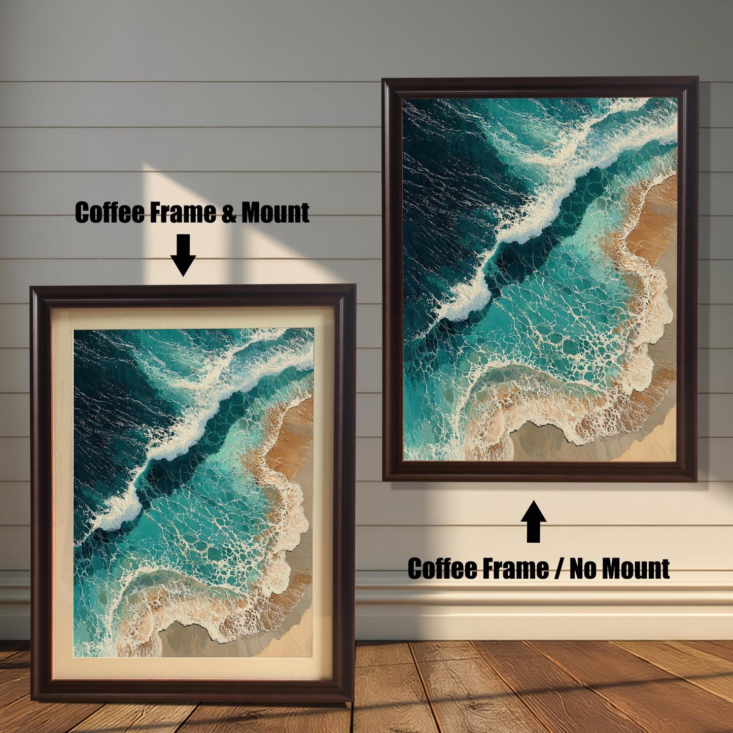 Two framed art prints are displayed against a wall with wainscoting. The one on the left has a coffee-colored frame with a mount, and the one on the right has a coffee-colored frame with no mount. The print itself is an aerial view of waves on a beach.