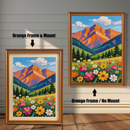 An orange-framed art print of a colorful mountain landscape is shown in two styles: with a mount (mat) on the left and without a mount on the right.