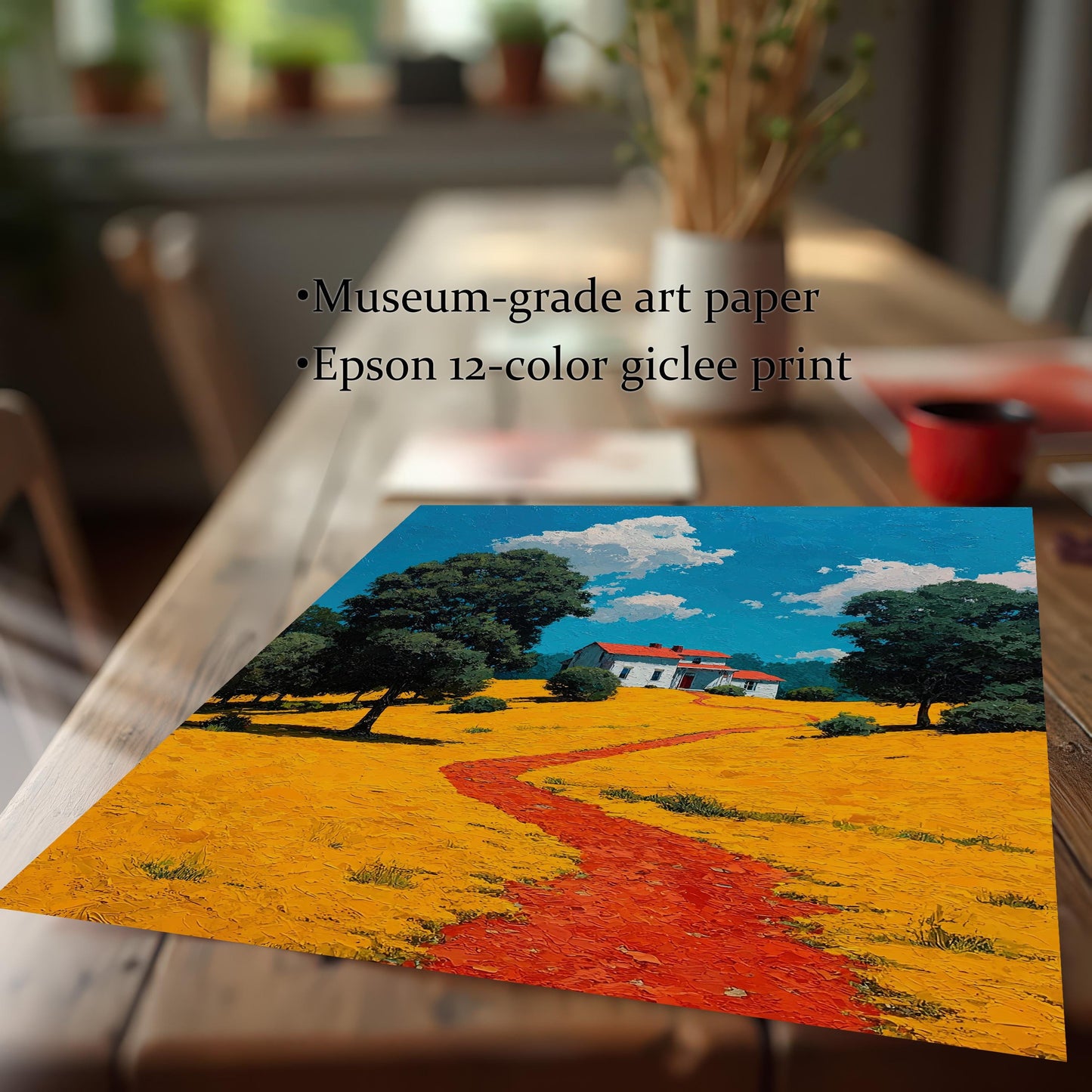 A low-angle shot of a landscape painting of a house with a red path and trees on a yellow field, shown on a rustic wooden table. Text overlays highlight its features: "Museum-grade art paper" and "Epson 12-color giclee print."
