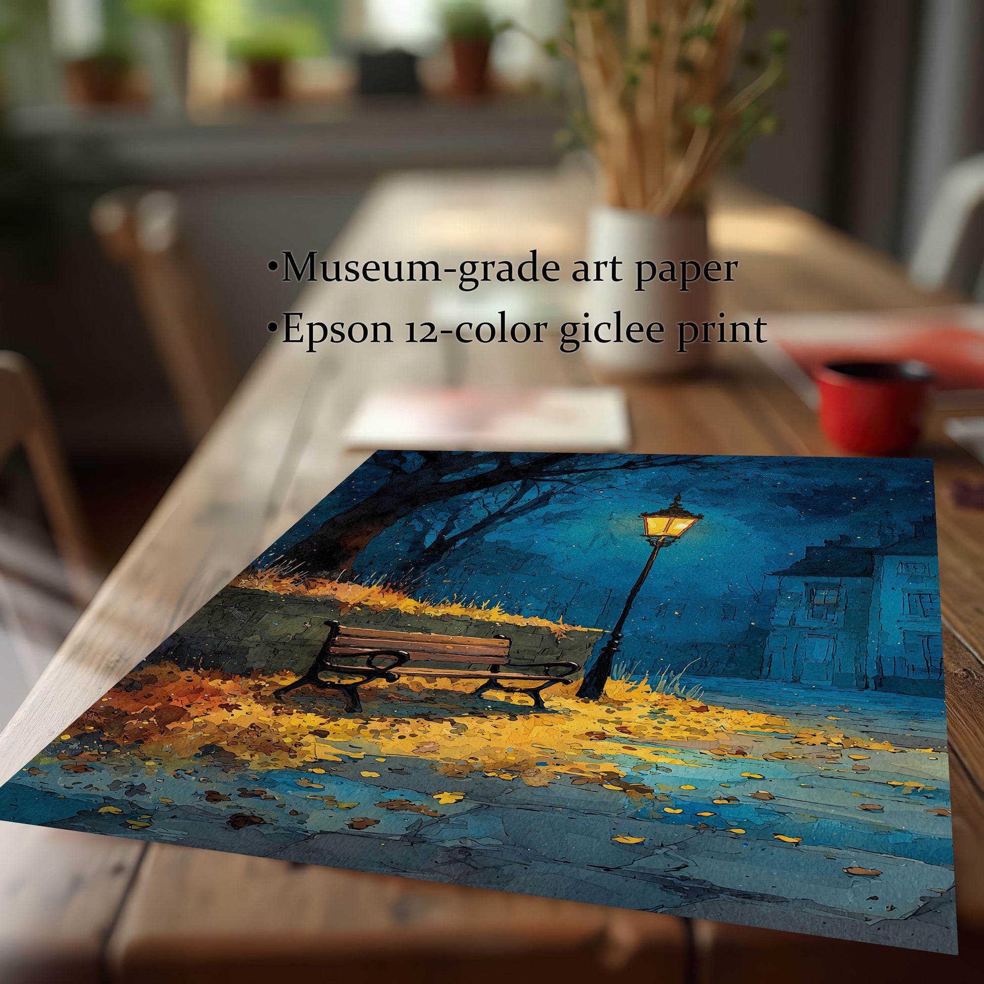 A close-up, angled view of a print showing a dark street, a lamppost, and fallen yellow leaves. The text "Museum-grade art paper" and "Epson 12-color giclee print" are listed next to the print.