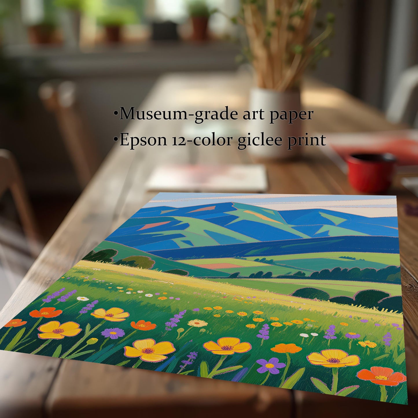 A close-up, angled view of a print showing a meadow with colorful flowers and mountains. The text lists "Museum-grade art paper" and "Epson 12-color giclee print" next to the print.