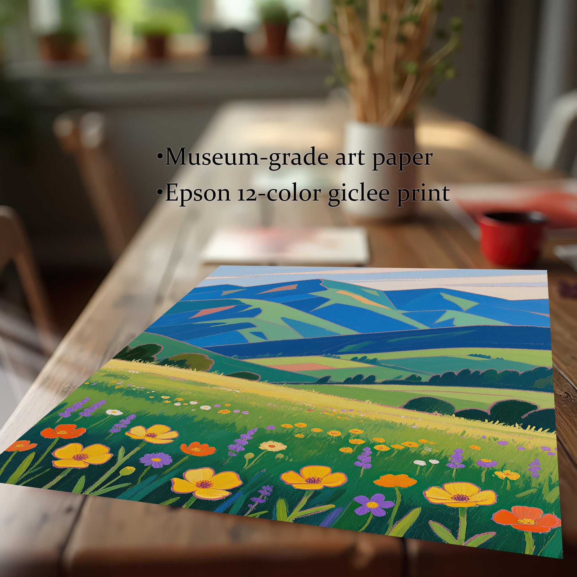A close-up, angled view of a print showing a meadow with colorful flowers and mountains. The text lists "Museum-grade art paper" and "Epson 12-color giclee print" next to the print.
