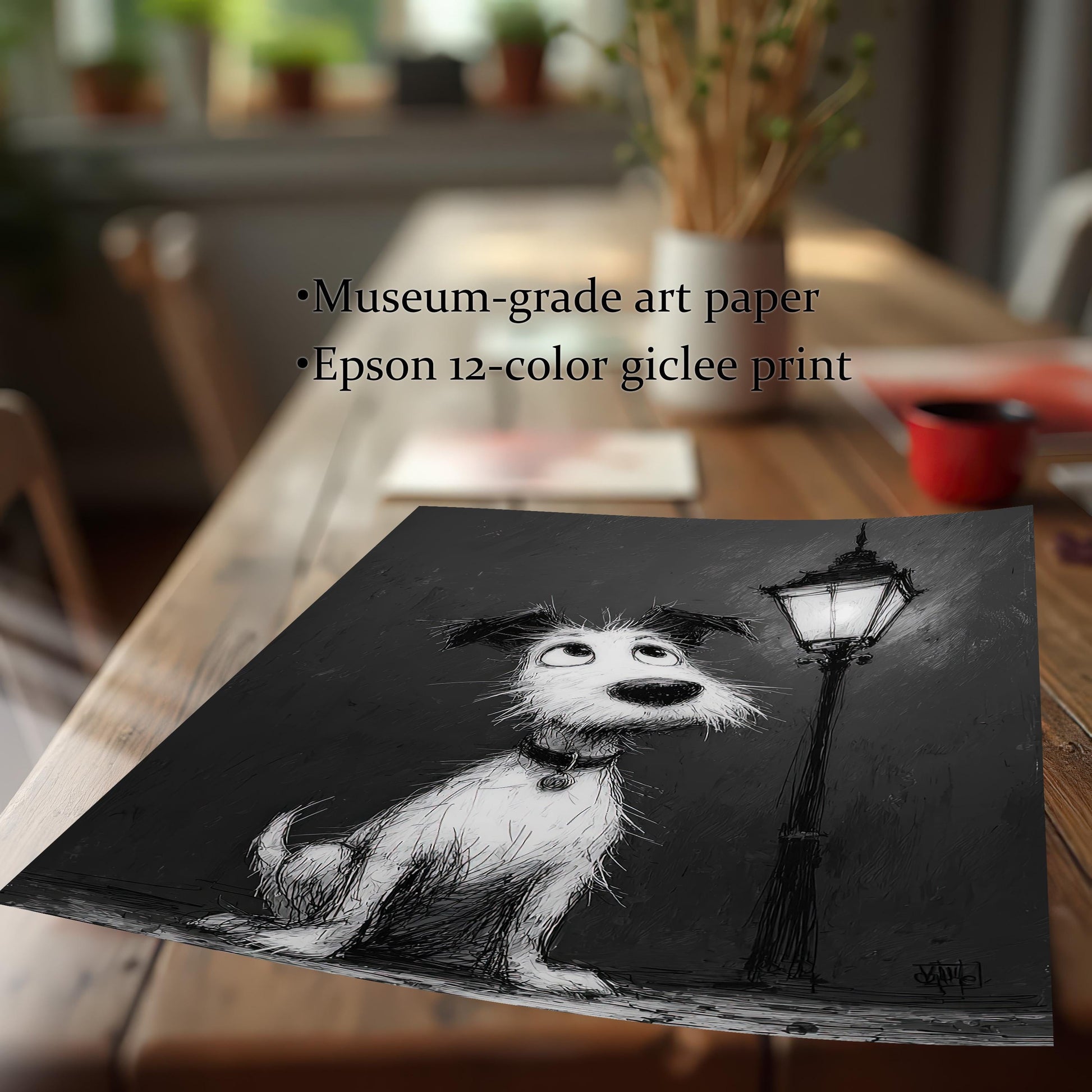 A square print of a black and white cartoon-style dog painting lying on a wooden table. Text describes the print quality: "Museum-grade art paper" and "Epson 12-color giclee print."