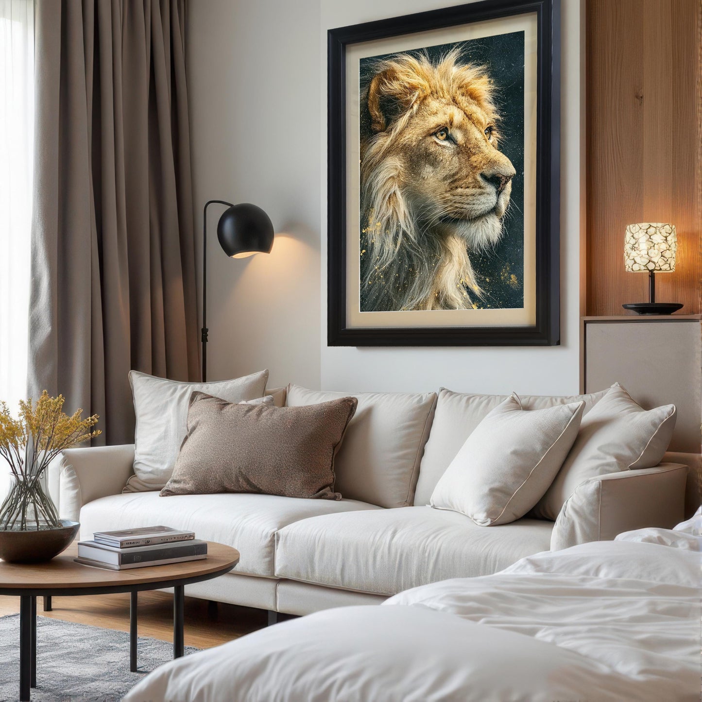 A framed portrait of a lion's head hanging above a white couch. The painting is in a black frame with a mat. The setting appears to be a modern living room or bedroom.