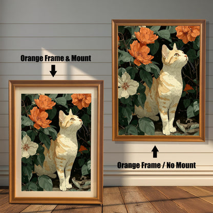 Two framed cat and flower prints side-by-side. The left is an "Orange Frame & Mount," and the right is an "Orange Frame / No Mount."