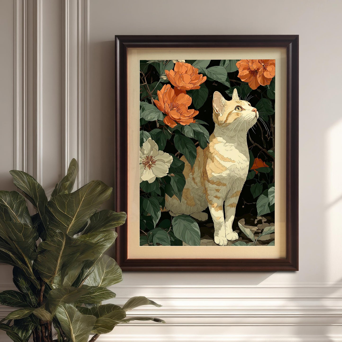 A framed wall art print of a cat among flowers, featuring a coffee/dark wood frame and a mount, hanging on a white paneled wall above a molding, next to a large potted plant.