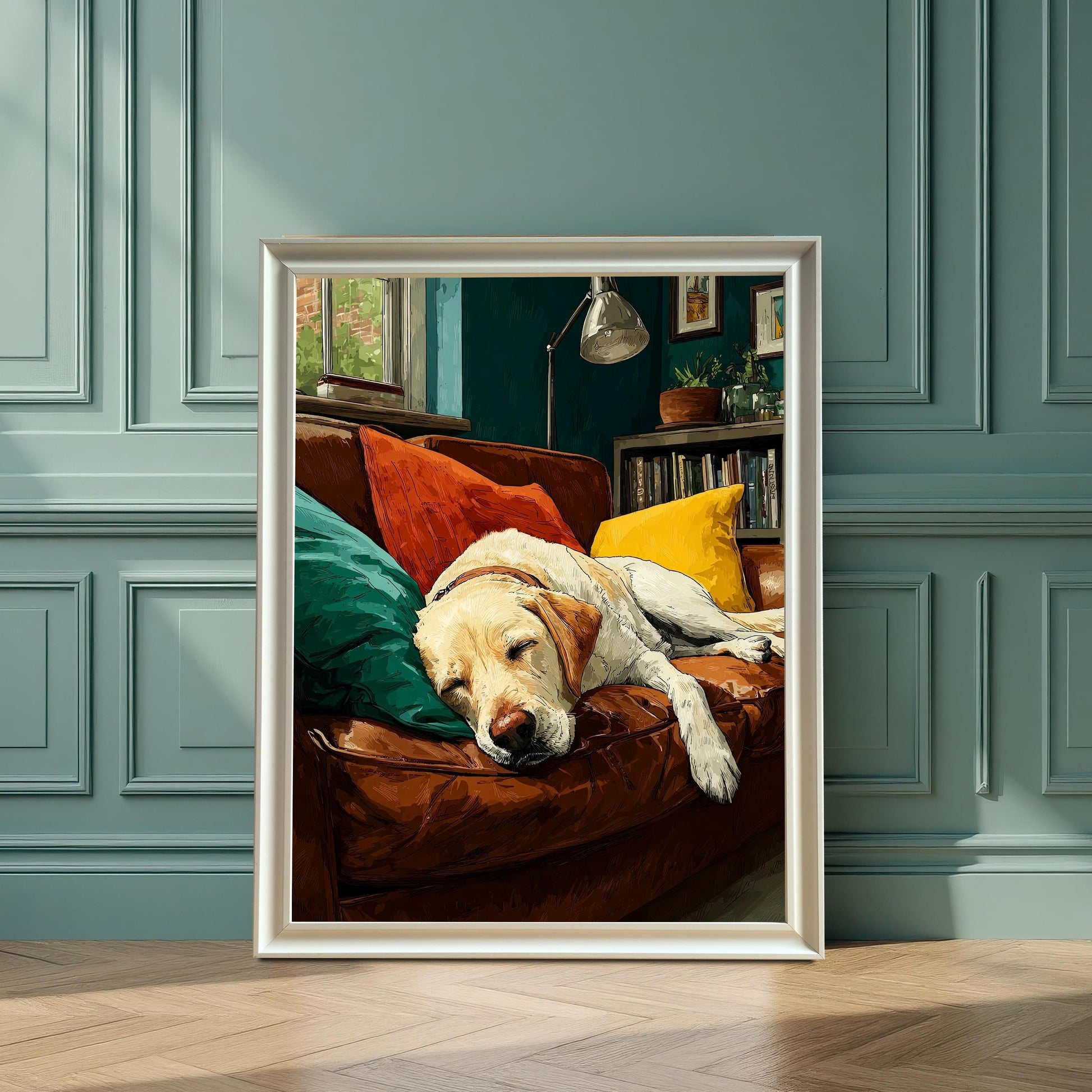 A white-framed art print of a sleeping dog on a couch leans against a blue paneled wall.