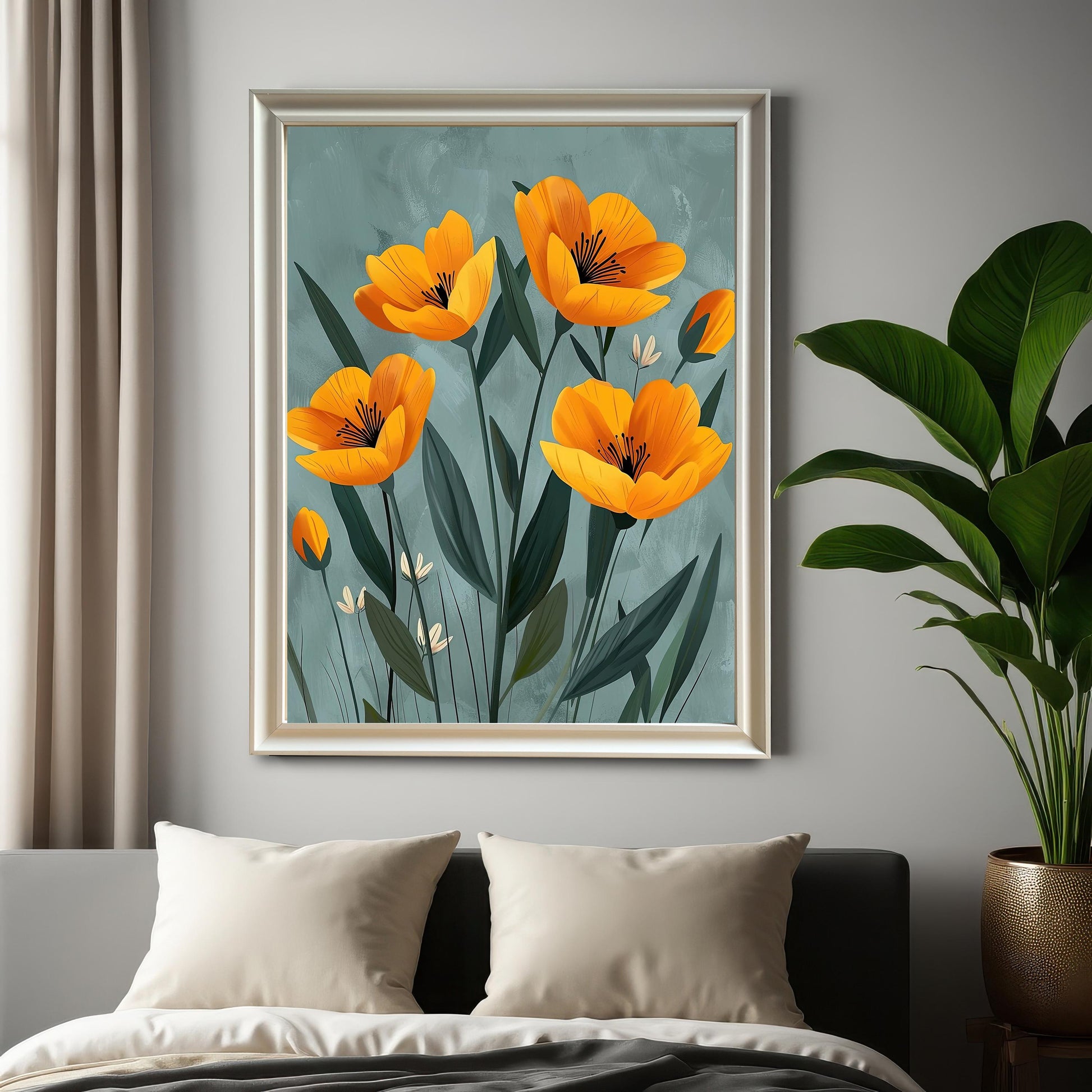 A framed wall art print of yellow flowers with a subtle gray background. The silver-framed art is hanging on a light gray wall in a bedroom, above a bed with pillows.