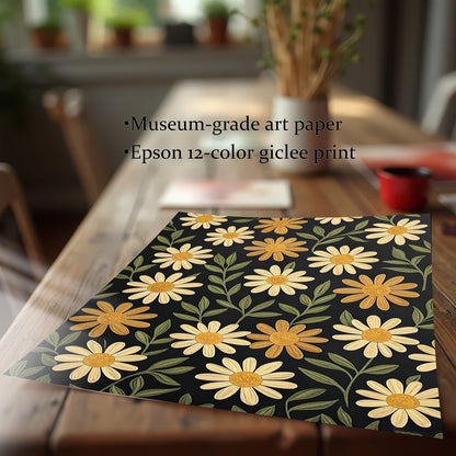 A flat art print of yellow flowers on a dark background on a wooden table, with text describing it as a "museum-grade art paper" and "Epson 12-color giclee print."