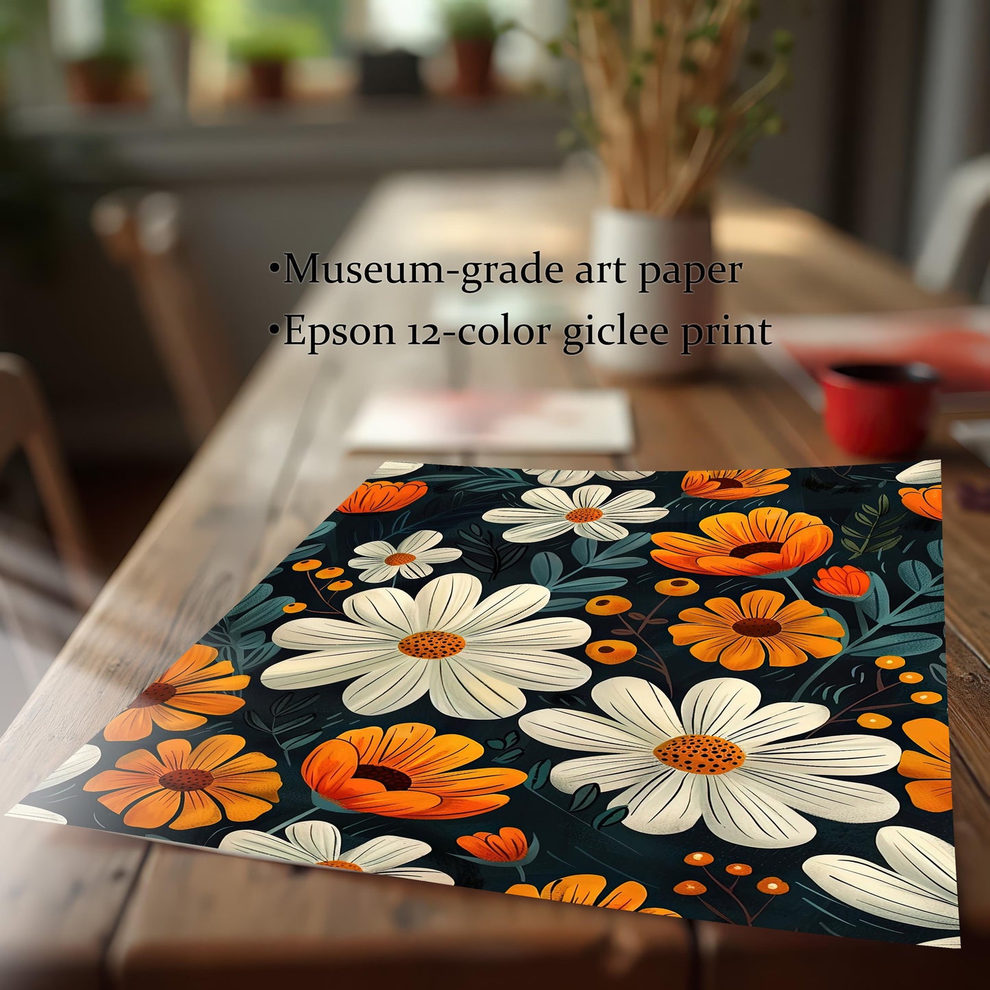 Close-up of an unframed art print with a white and orange floral pattern on a dark background, resting on a wooden table. Text lists "Museum-grade art paper" and "Epson 12-color giclee print."