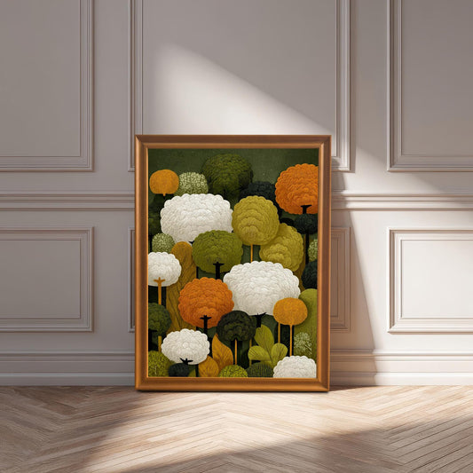 An orange-framed art print of abstract trees leans against a white paneled wall on a wood floor with sun shining on it.