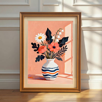 A framed art print featuring a vase of flowers with a light orange background. The print is leaning against a white wainscoted wall on a hardwood floor, with sunlight casting a shadow.