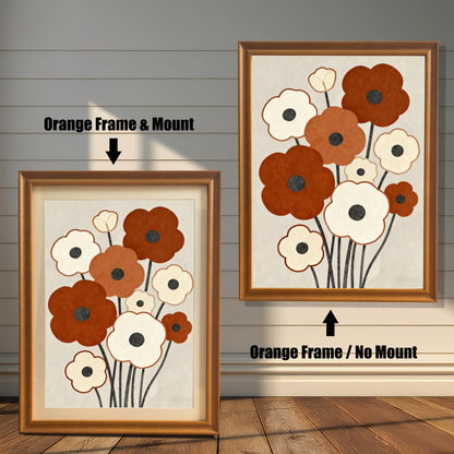 Two framed abstract floral paintings with brown and white flowers and a warm orange frame. One has a white matting, and the other does not.