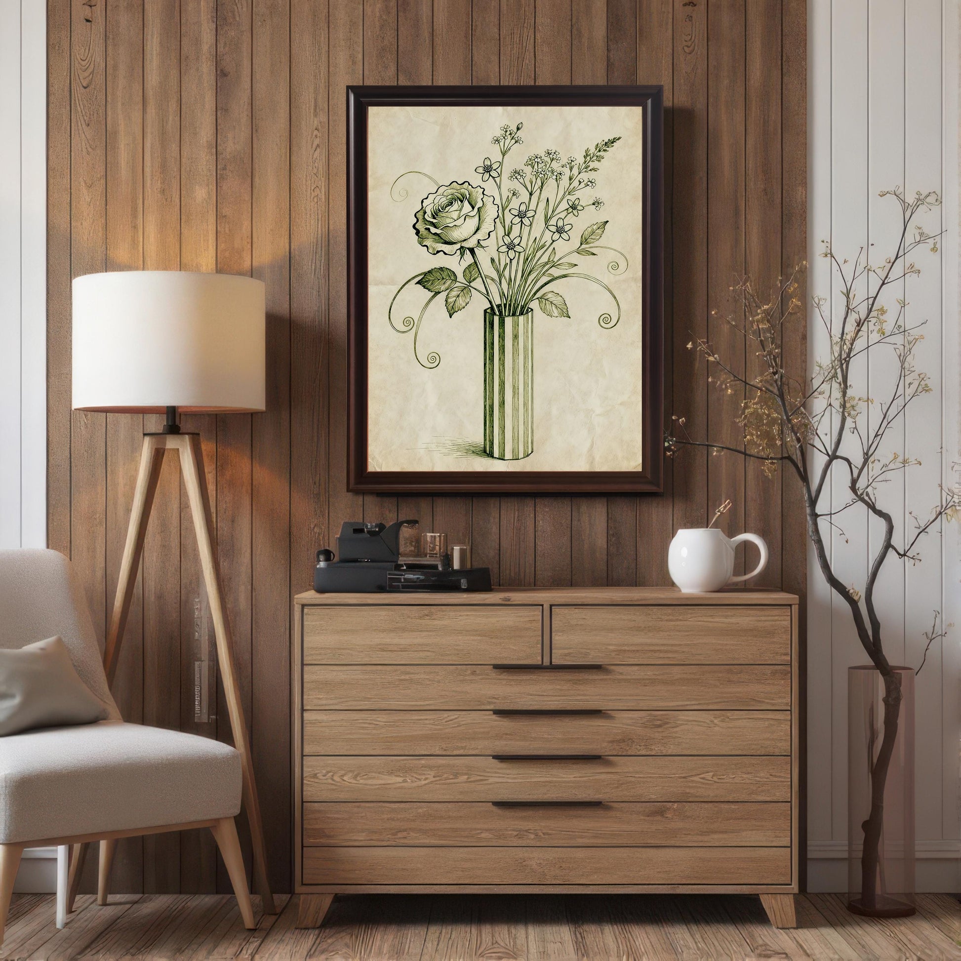 A framed art print of a vintage-style rose and flowers in a vase hangs above a wooden dresser. The room has a wood-paneled wall, a floor lamp, and a plant.
