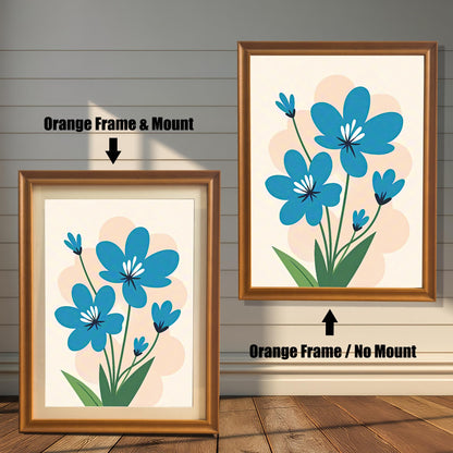 A side-by-side comparison of two orange-framed prints of a blue flower painting. The print on the left is smaller with a mount (matting), while the larger one on the right has no mount.