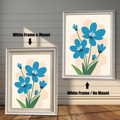 A side-by-side comparison of two white-framed prints of a blue flower painting. The print on the left is smaller with a mount (matting), while the larger one on the right has no mount.