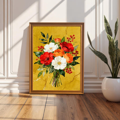 A framed watercolor print of a red, white, and orange floral bouquet in a gold frame propped on a wooden floor next to a white wainscoted wall with a houseplant to its right.
