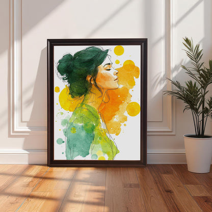 A watercolor print of a woman in a coffee-colored frame, leaning against a white wall and a white decorative wainscot. A houseplant sits to the right of the print.