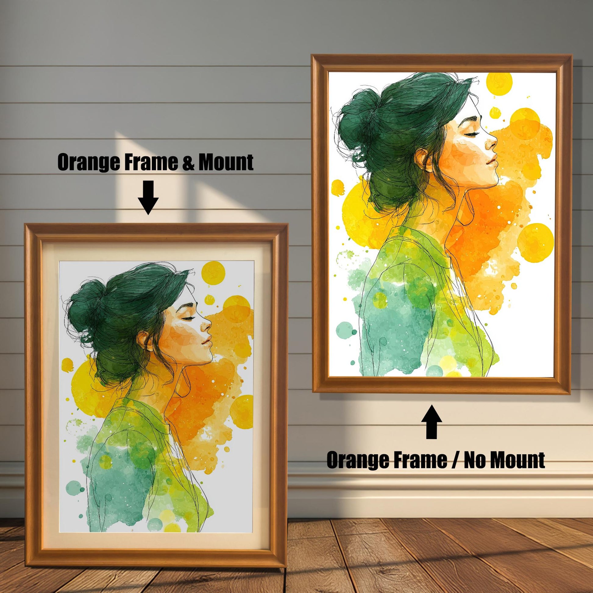 Two framed watercolor prints of a woman with her hair in a bun. The frames are an orange wood tone. One print has a mount, and the other is shown without.