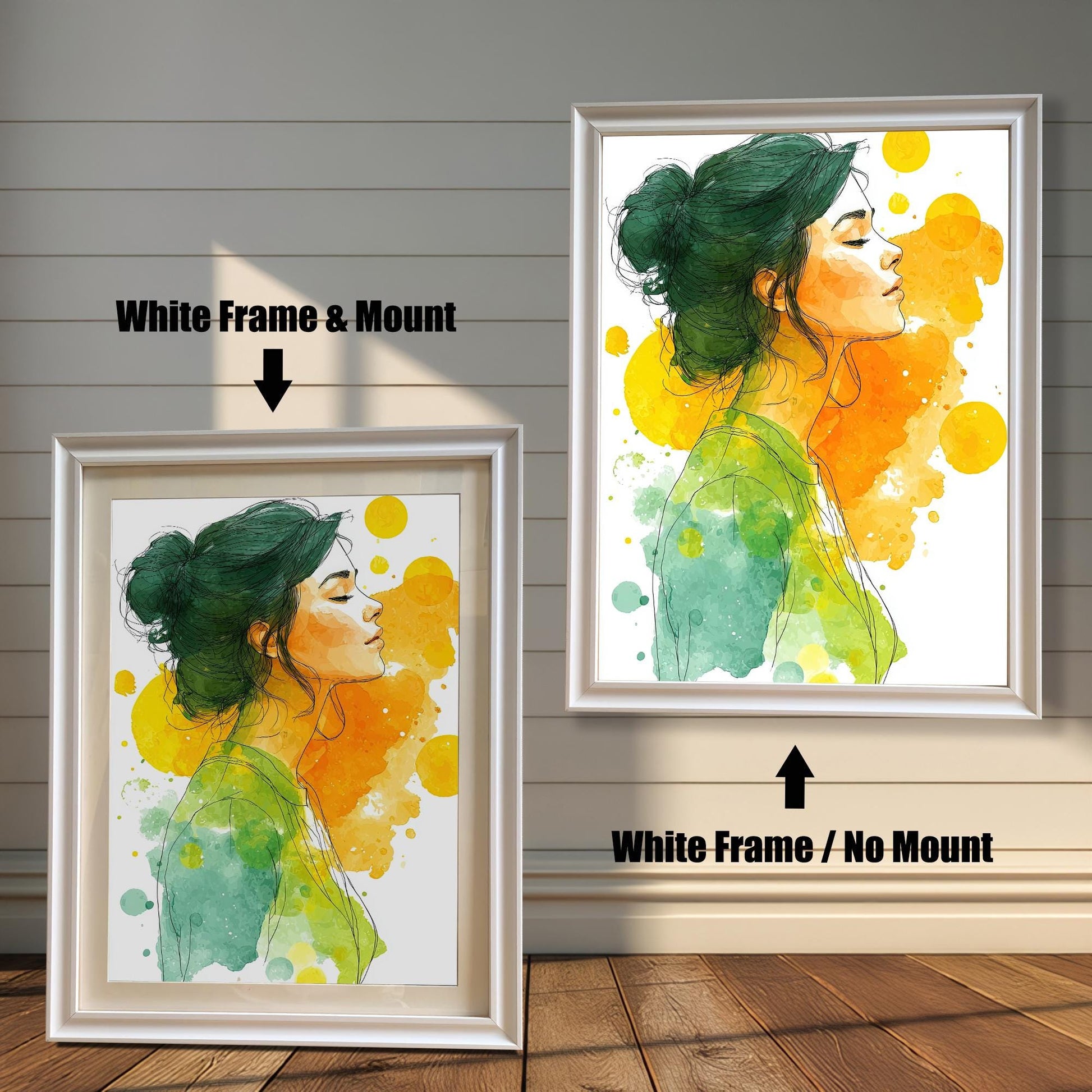 A white framed watercolor art print of a woman with her hair in a bun and eyes closed. One frame includes a white mount, and the other does not, highlighting the difference.