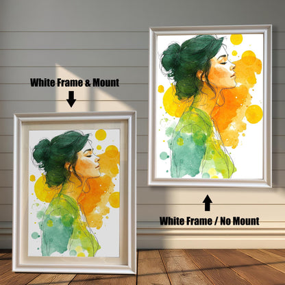 A white framed watercolor art print of a woman with her hair in a bun and eyes closed. One frame includes a white mount, and the other does not, highlighting the difference.
