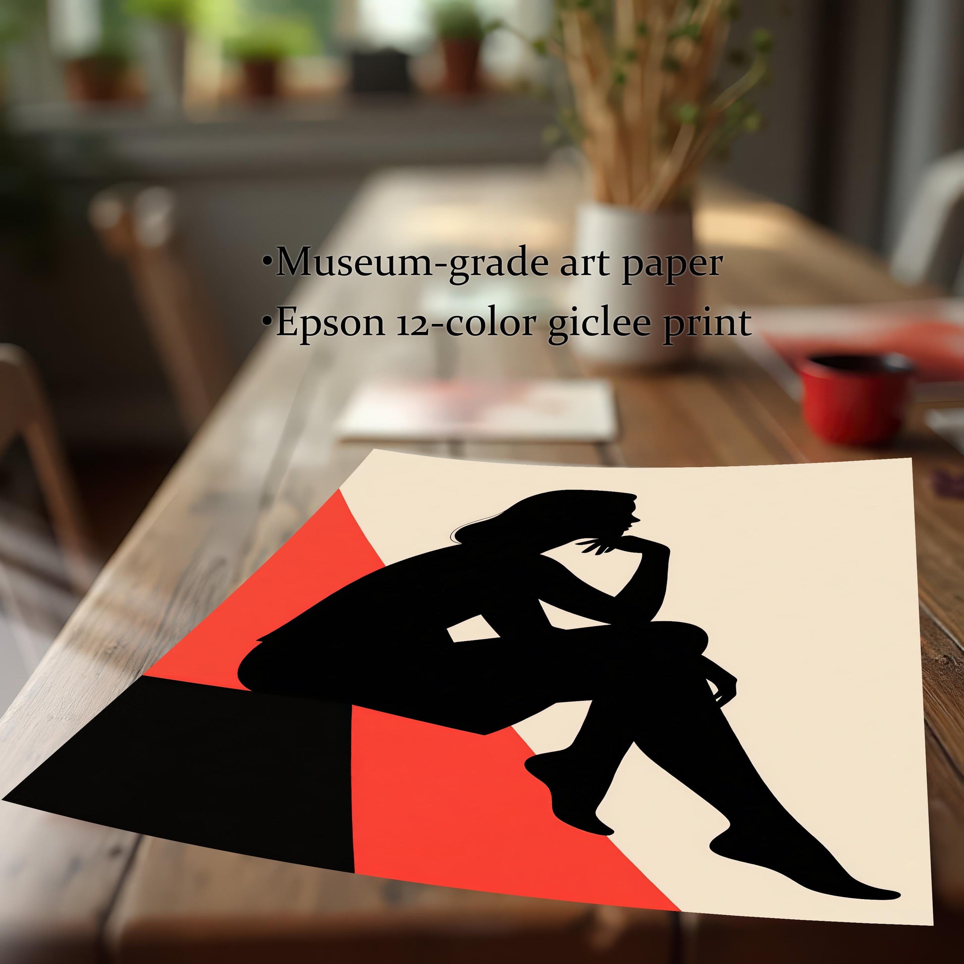 An unframed print of a stylized silhouette on a wooden table. The text above it highlights its quality: "Museum-grade art paper" and "Epson 12-color giclee print."