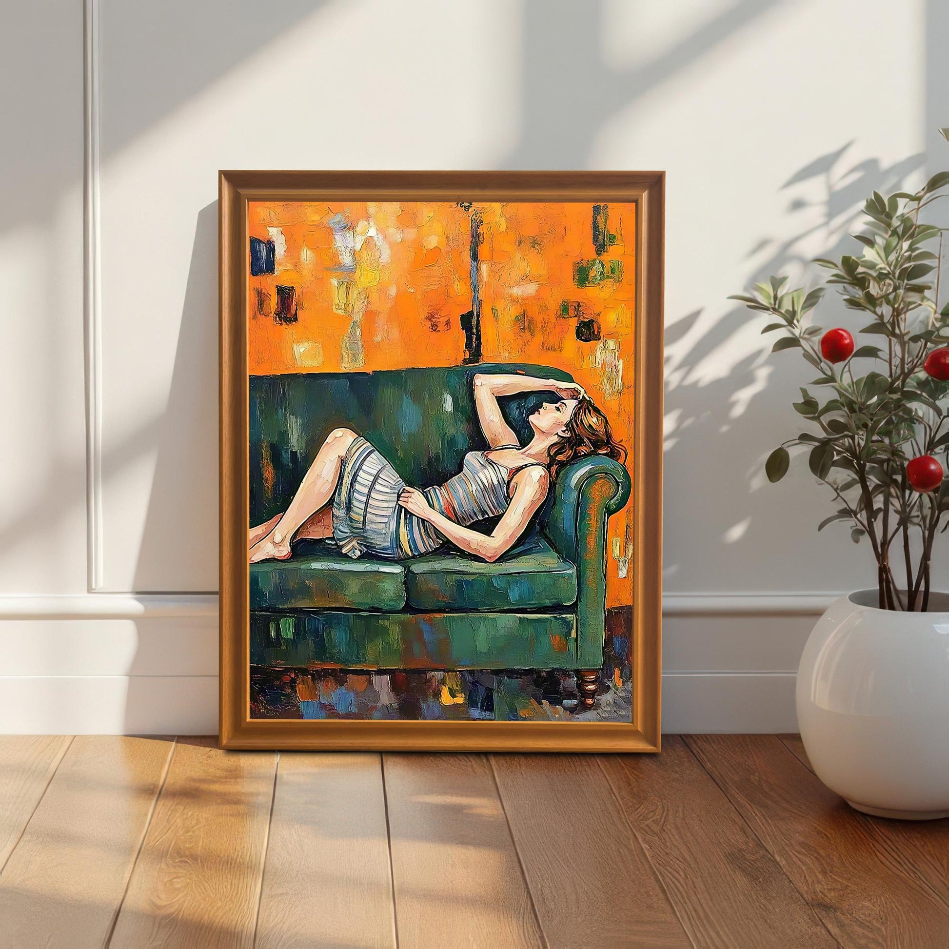 A large, framed painting with a gold frame leans against a white paneled wall. The painting is a textured portrait of a woman reclining on a green couch.