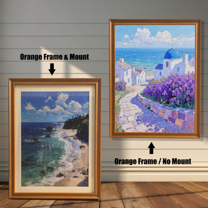 A painting of a Greek seaside village is shown in two orange frames against a wood wall. One has a mount, and the other doesn't, illustrating the framing options. A different landscape painting is also shown.