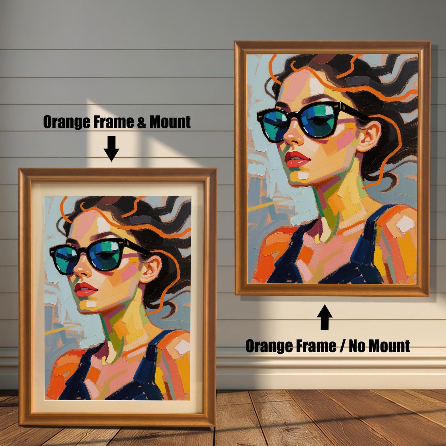 An art print of a woman in sunglasses is shown in two orange-colored frames against a rustic wood wall. One has a mount, the other does not.