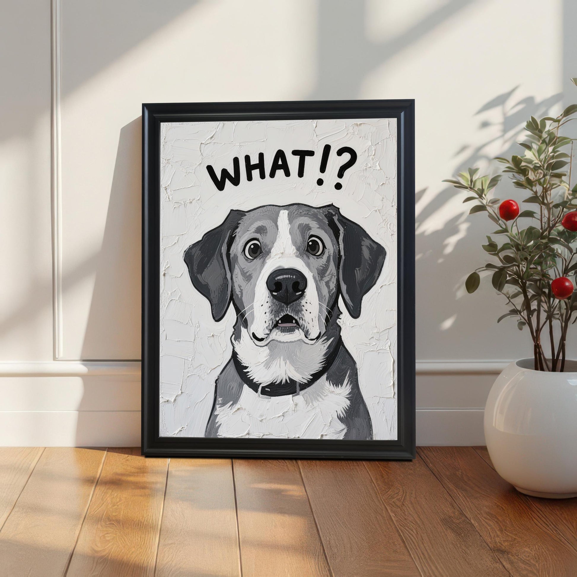 A framed art print of a surprised-looking dog with the text **WHAT!?** above its head, in a black frame, leaning against a white wainscoting wall.