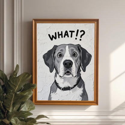 A framed art print of a surprised-looking dog with the text **WHAT!?** above its head, in an orange/wood frame, hanging on a white wall next to a large houseplant.