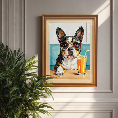 A framed oil painting of a Boston Terrier dog in sunglasses sitting at a table with a glass of orange juice. The painting hangs on a beige wall next to a houseplant.