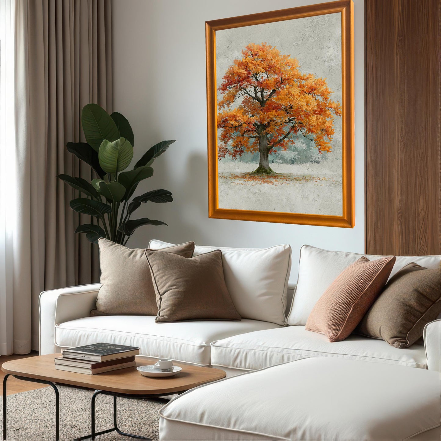 A large, orange-framed painting of an autumn tree hangs on a white wall above a long, white sectional sofa in a modern living room.
